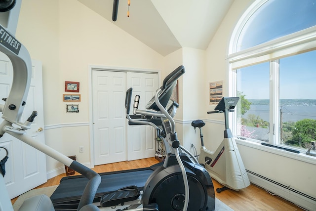 235 S Blvd, Nyack, NY 10960 - workout area featuring plenty of natural light, lofted ceiling, a water view, wood finished floors, and baseboard heating
