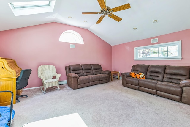 carpeted living room with vaulted ceiling with skylight, ceiling fan, a baseboard heating unit, and visible vents