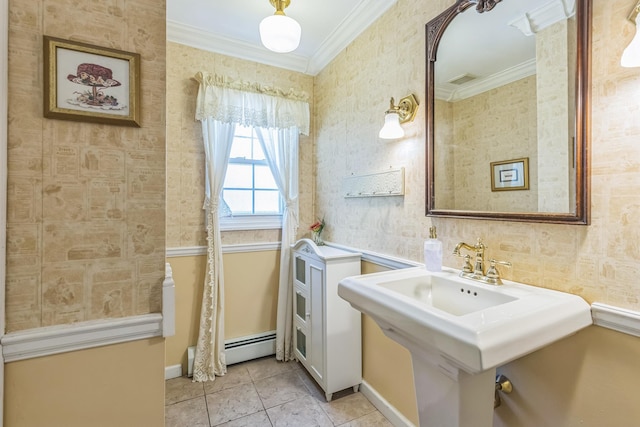 bathroom with crown molding, tile patterned flooring, baseboards, wallpapered walls, and a sink