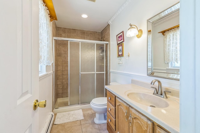 full bath with vanity, toilet, baseboard heating, tile patterned floors, and a stall shower