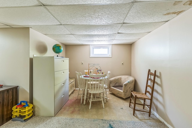 dining room with a paneled ceiling