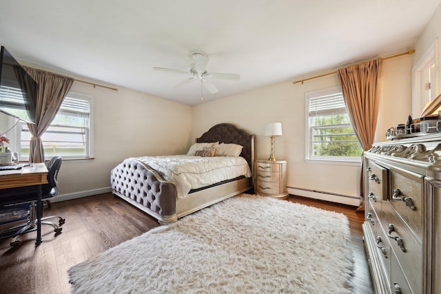 bedroom featuring baseboards, baseboard heating, ceiling fan, and dark wood-style floors