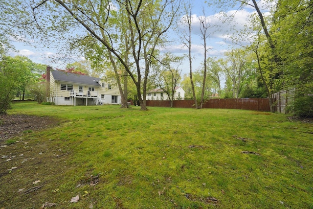 view of yard featuring fence