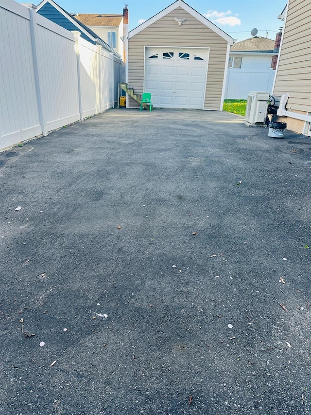 10 N Crescent Dr, Farmingdale, NY 11735 - detached garage featuring fence