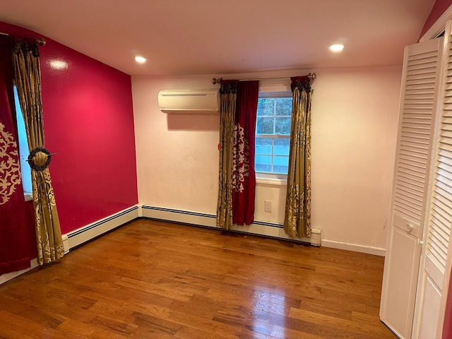 10 N Crescent Dr, Farmingdale, NY 11735 - unfurnished room featuring recessed lighting, baseboards, wood finished floors, and a wall mounted air conditioner