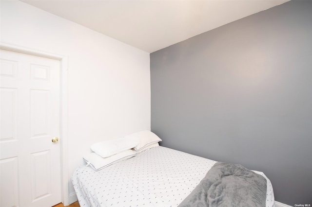 bedroom featuring baseboards