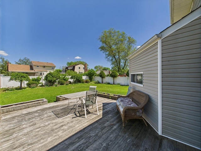 wooden terrace with outdoor dining area