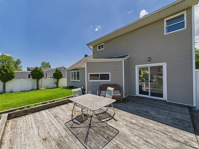 wooden terrace featuring outdoor dining space