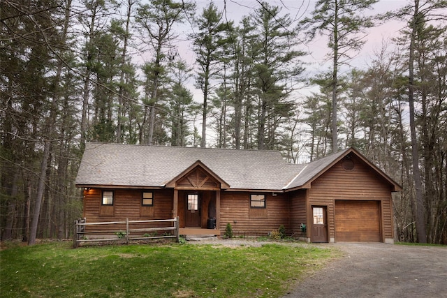 15 Chapin Trl, White Lake, NY 12720 - view of front of property with a shingled roof, an attached garage, driveway, and a front lawn