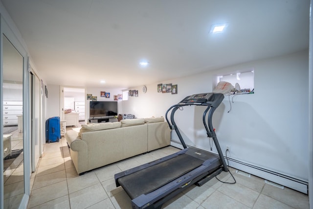 workout room with light tile patterned floors