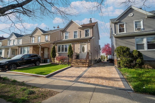 view of front of home with a front lawn