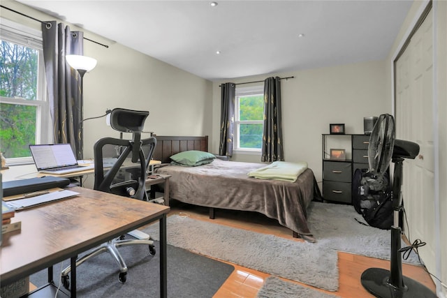 bedroom featuring wood finished floors