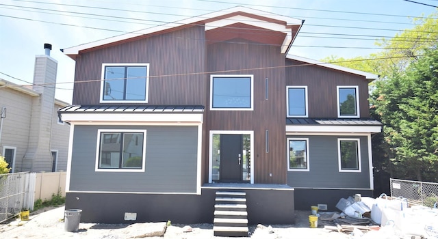 141 Flamingo St, Atlantic Beach, NY 11509 - view of front of house with a standing seam roof and metal roof