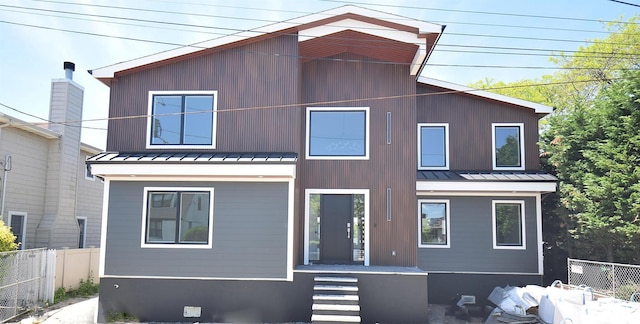 141 Flamingo St, Atlantic Beach, NY 11509 - view of front facade with a standing seam roof and metal roof