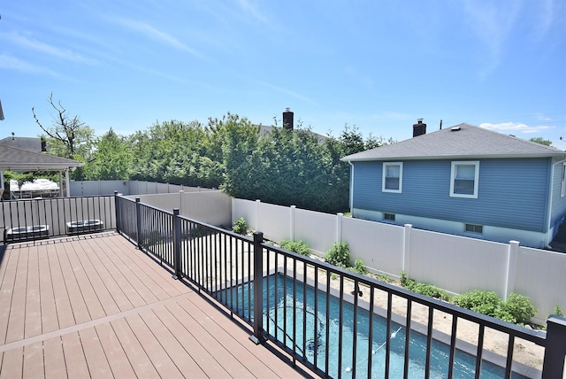 141 Flamingo St, Atlantic Beach, NY 11509 - view of swimming pool with a fenced backyard and a deck