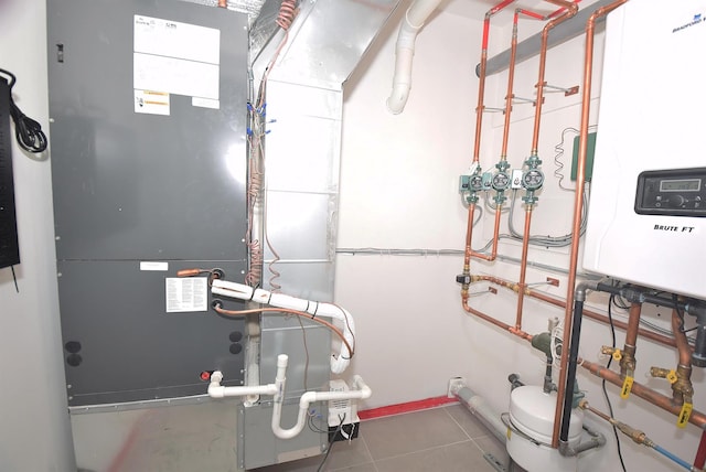 141 Flamingo St, Atlantic Beach, NY 11509 - utility room featuring heating unit and water heater