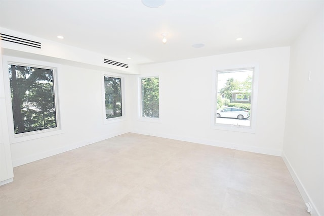 141 Flamingo St, Atlantic Beach, NY 11509 - unfurnished room featuring healthy amount of natural light, baseboards, and recessed lighting