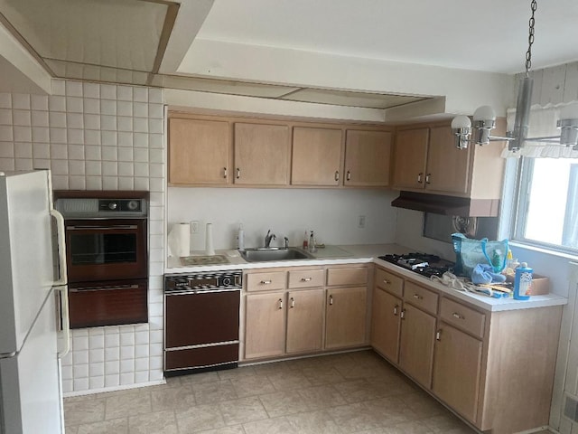 160-38 85th St, Howard Beach, NY 11414 - kitchen featuring oven, freestanding refrigerator, a sink, black dishwasher, and light countertops
