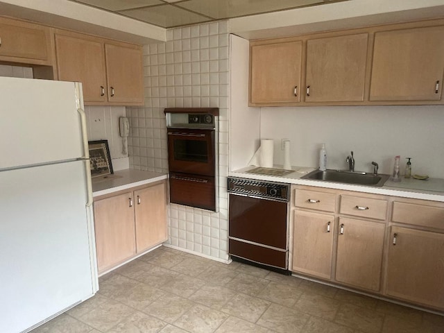 160-38 85th St, Howard Beach, NY 11414 - kitchen with freestanding refrigerator, a sink, dishwasher, and light countertops