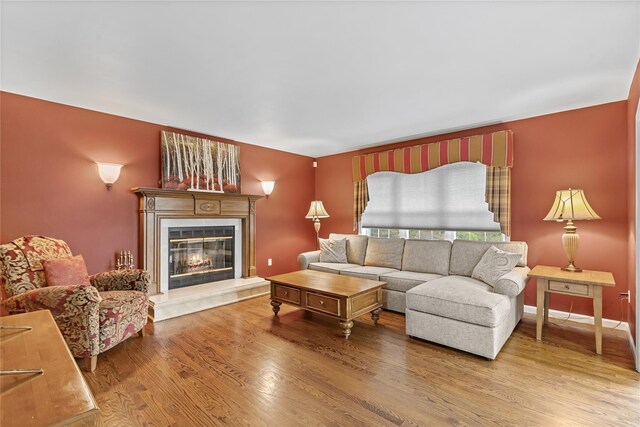 26 Garrity Blvd, Brewster, NY 10509 - living area featuring a premium fireplace and wood finished floors