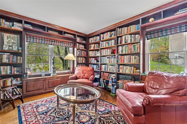 26 Garrity Blvd, Brewster, NY 10509 - living area with wall of books, a wealth of natural light, light wood-type flooring, and built in features