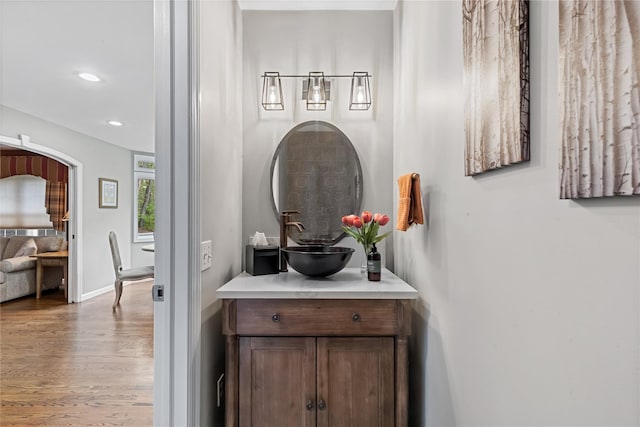 26 Garrity Blvd, Brewster, NY 10509 - bathroom with baseboards, vanity, recessed lighting, and wood finished floors
