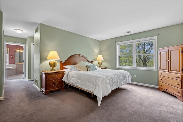26 Garrity Blvd, Brewster, NY 10509 - carpeted bedroom featuring baseboards, connected bathroom, and visible vents