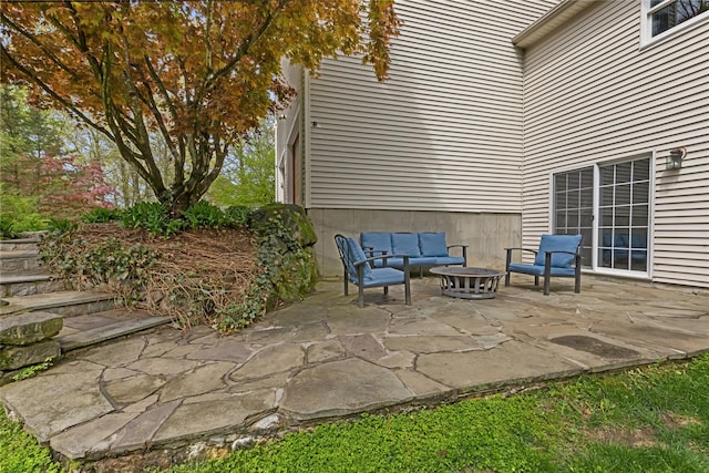 26 Garrity Blvd, Brewster, NY 10509 - view of patio with an outdoor living space with a fire pit