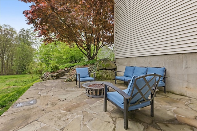 26 Garrity Blvd, Brewster, NY 10509 - view of patio / terrace featuring an outdoor living space with a fire pit