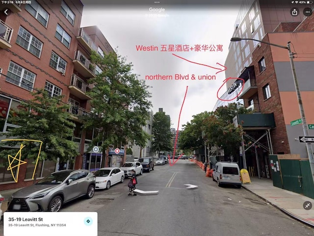 35-19 Leavitt Unit 5H, Flushing, NY 11354 - view of asphalt road featuring sidewalks, street lighting, and curbs