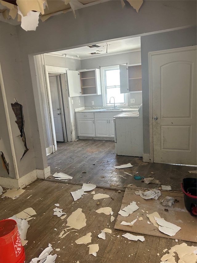 kitchen with white cabinets, open shelves, and dark wood-type flooring