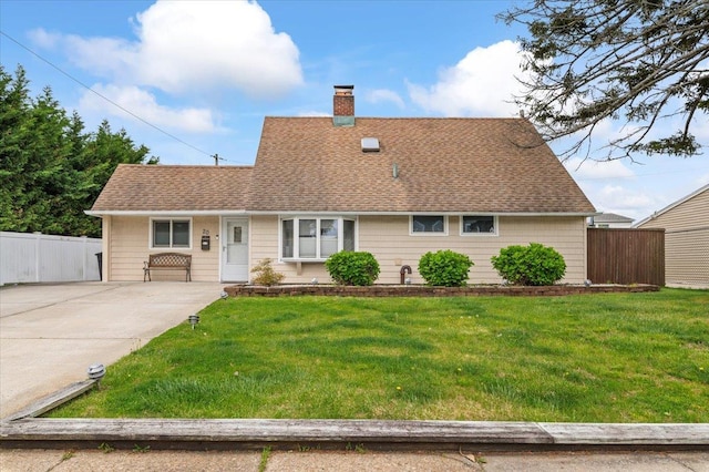 cape cod house featuring a chimney, roof with shingles, and concrete driveway