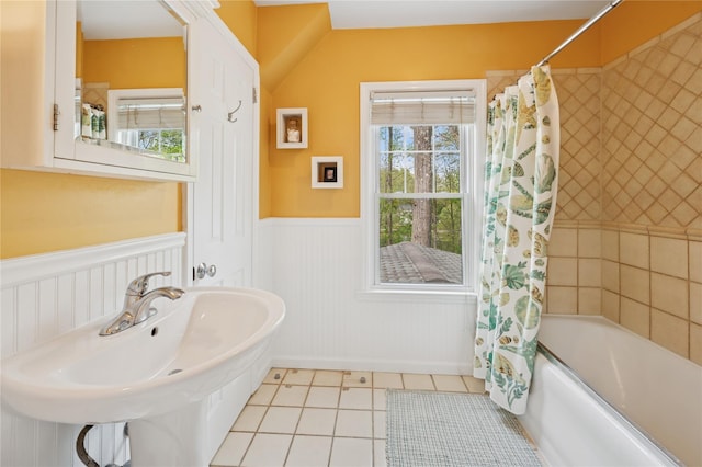 90 Shingle House Rd, Millwood, NY 10546 - bathroom featuring tile patterned flooring, a wainscoted wall, shower / bath combo with shower curtain, and a sink