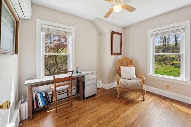 90 Shingle House Rd, Millwood, NY 10546 - living area featuring a wall mounted air conditioner, baseboards, and light wood finished floors