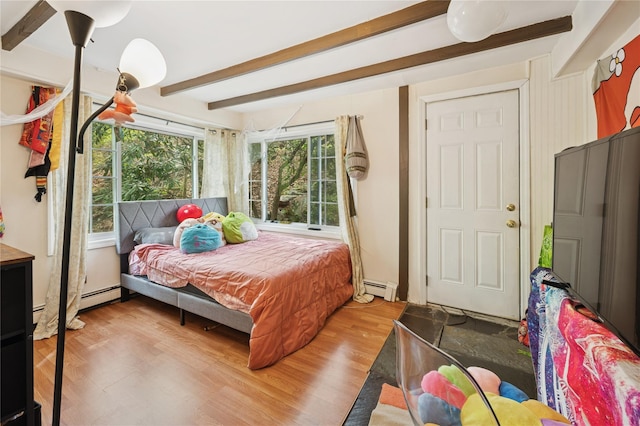 90 Shingle House Rd, Millwood, NY 10546 - bedroom with a baseboard radiator, beamed ceiling, and wood finished floors