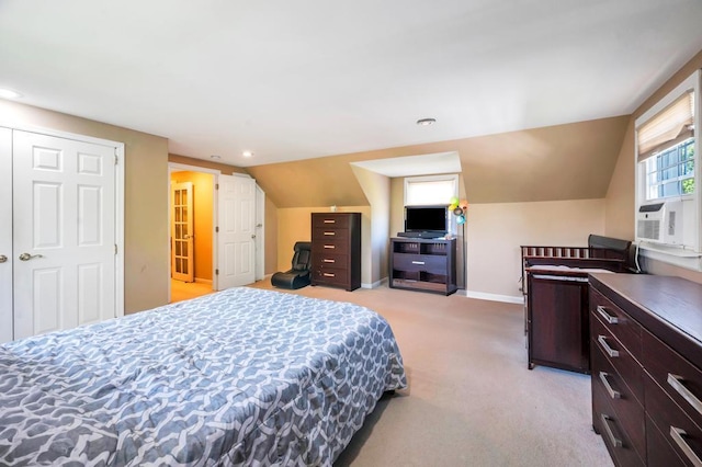 bedroom with light colored carpet, lofted ceiling, baseboards, cooling unit, and recessed lighting