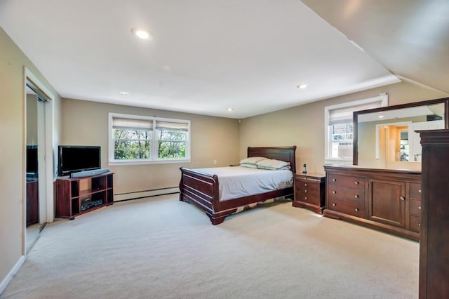 bedroom featuring baseboard heating, carpet, multiple windows, recessed lighting, and baseboards