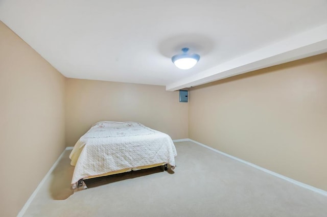 bedroom featuring carpet, baseboards, and electric panel