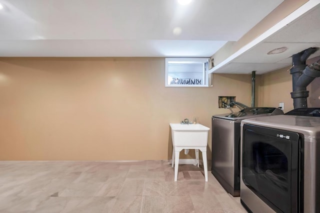 laundry area with washer and dryer