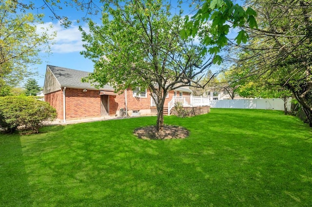 view of yard with a deck