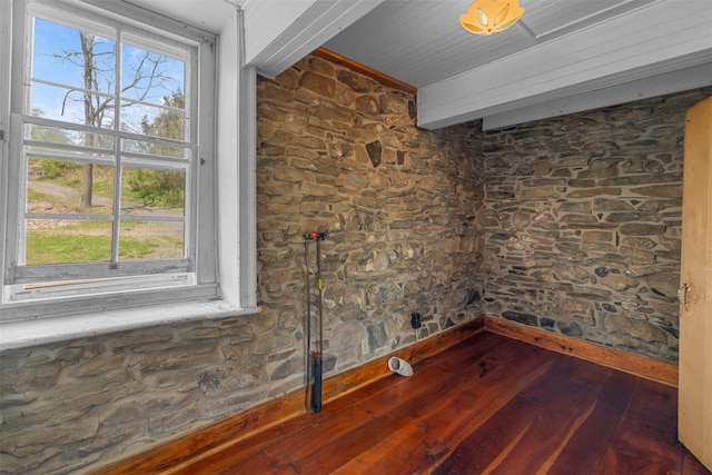 empty room with hardwood / wood-style floors