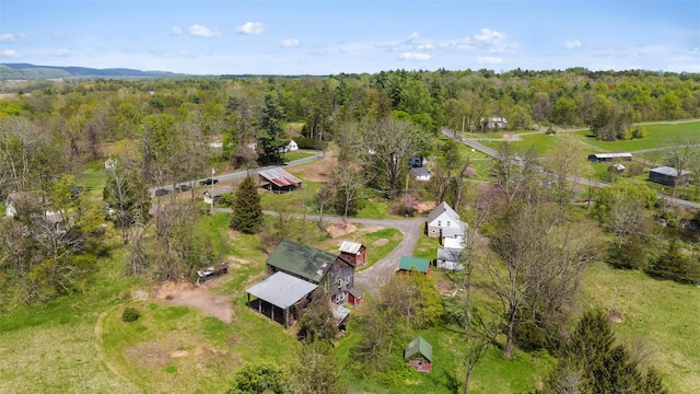 aerial view featuring a view of trees