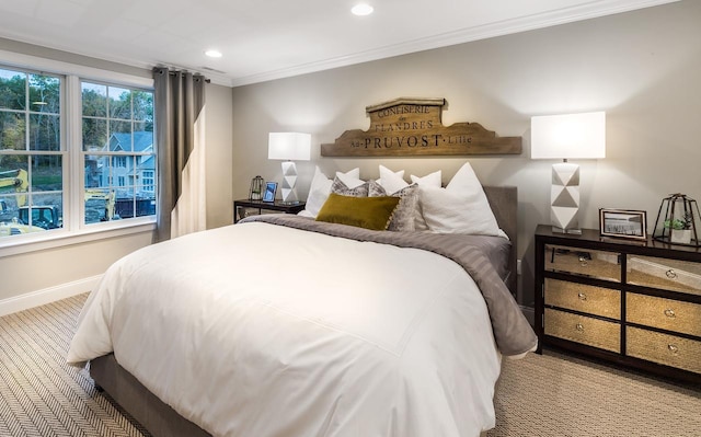carpeted bedroom featuring baseboards, crown molding, and recessed lighting