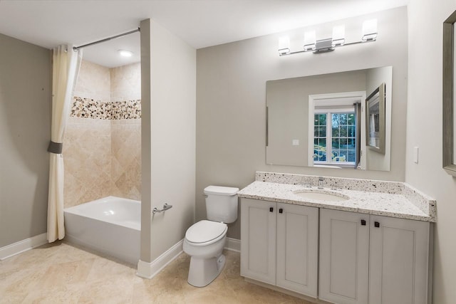 bathroom featuring baseboards, toilet, vanity, shower / bath combo, and tile patterned floors
