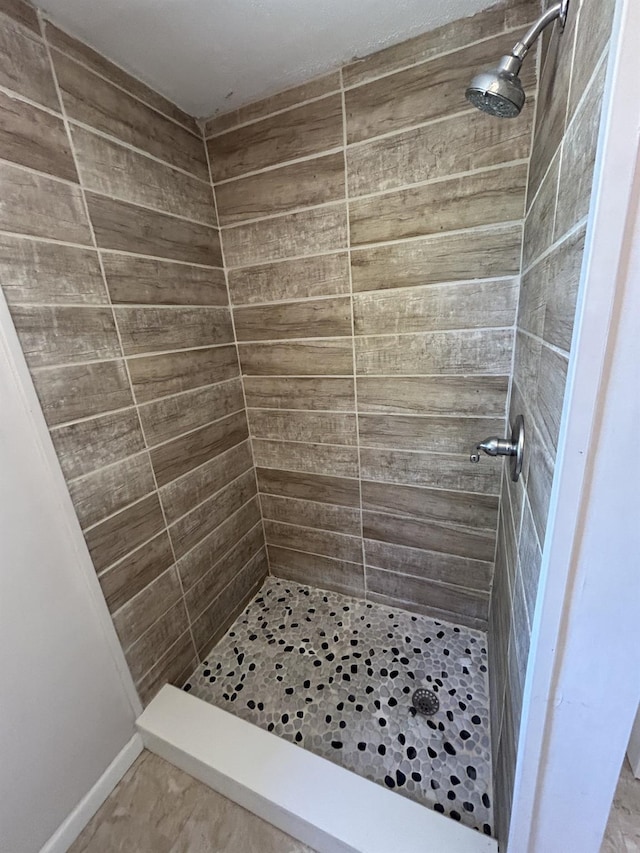 full bath featuring a stall shower