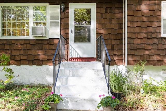 property entrance featuring cooling unit