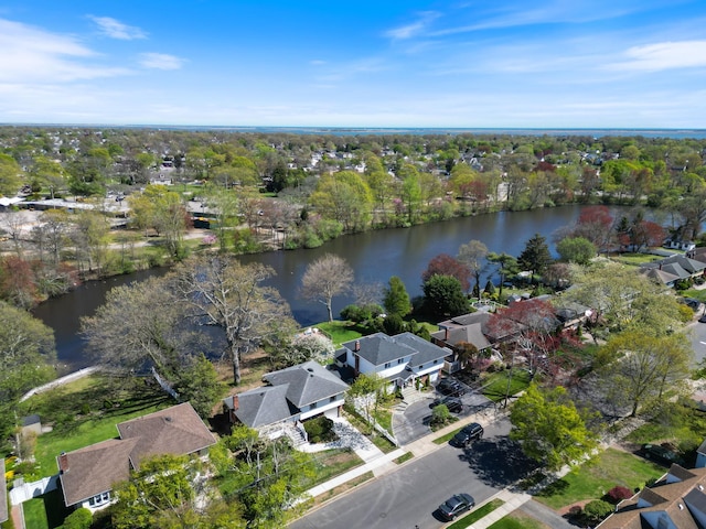 aerial view with a water view and a residential view