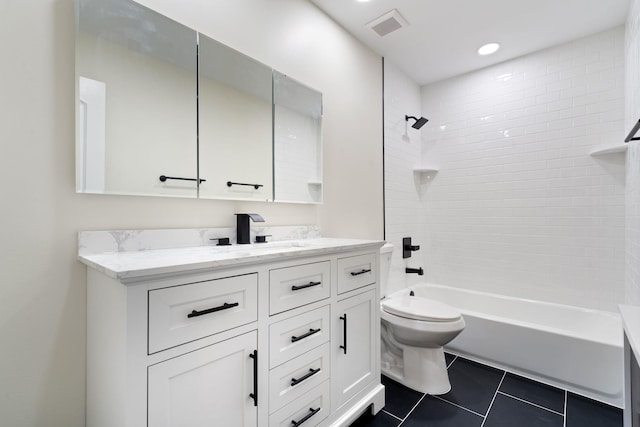 bathroom with toilet,  shower combination, tile patterned floors, visible vents, and vanity
