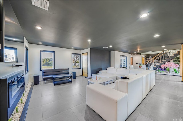 110 Schooner Ln, Copiague, NY 11726 - interior space with light tile patterned floors, stairs, recessed lighting, and visible vents