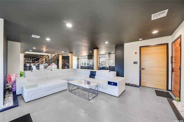 110 Schooner Ln, Copiague, NY 11726 - tiled living room featuring recessed lighting and visible vents